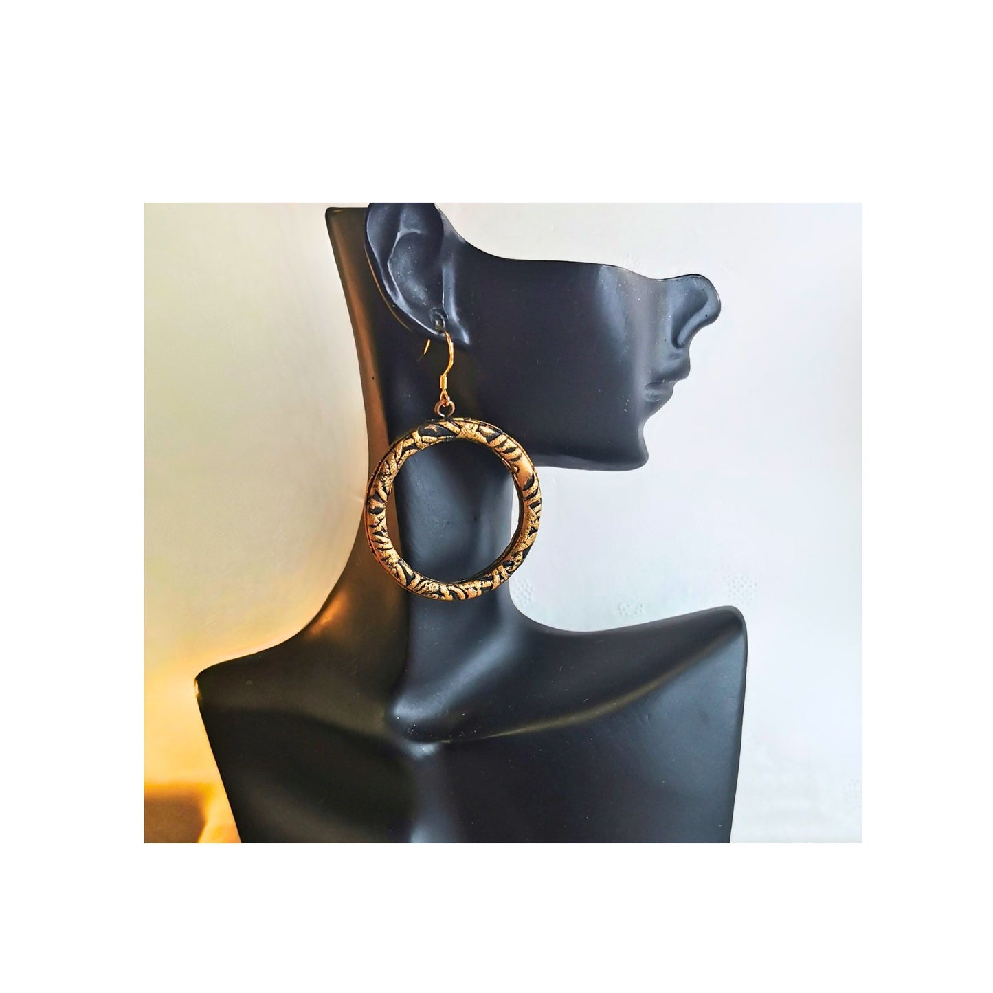 Black hoops with gold accents