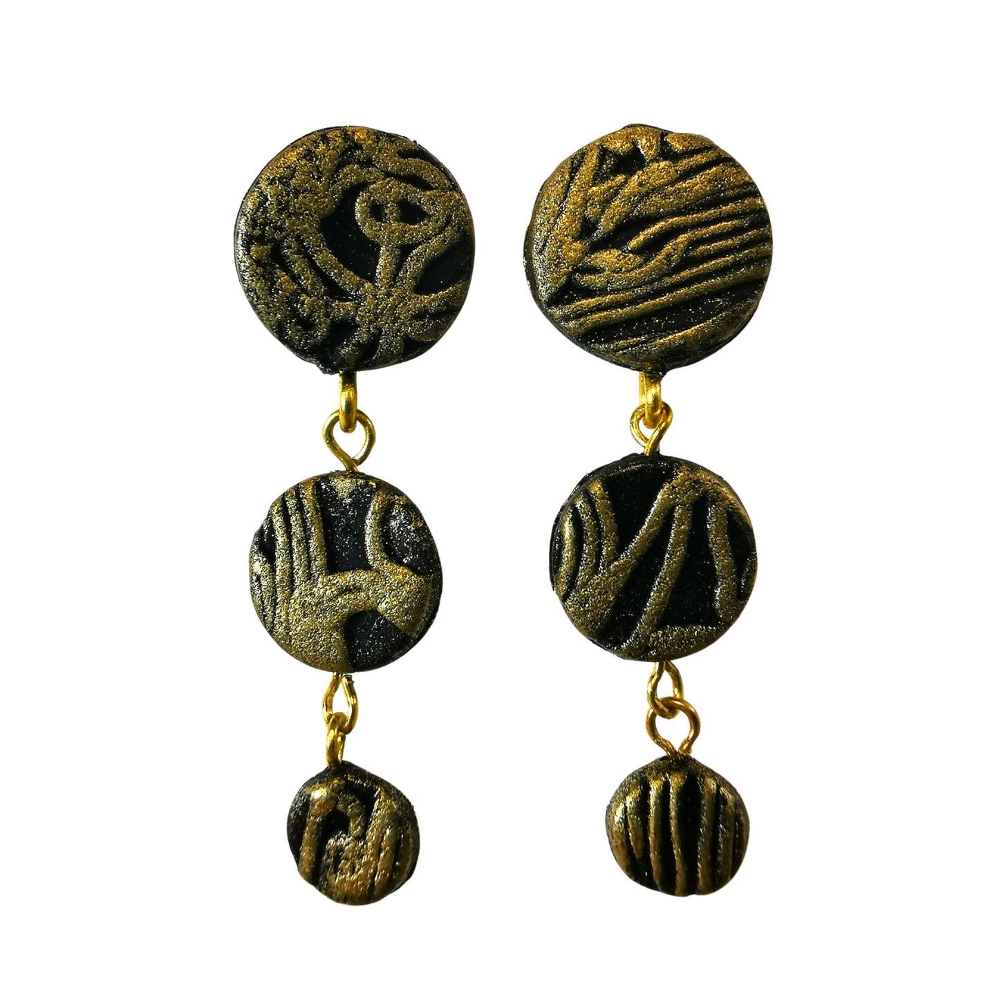 Threefold black earrings with gold accents