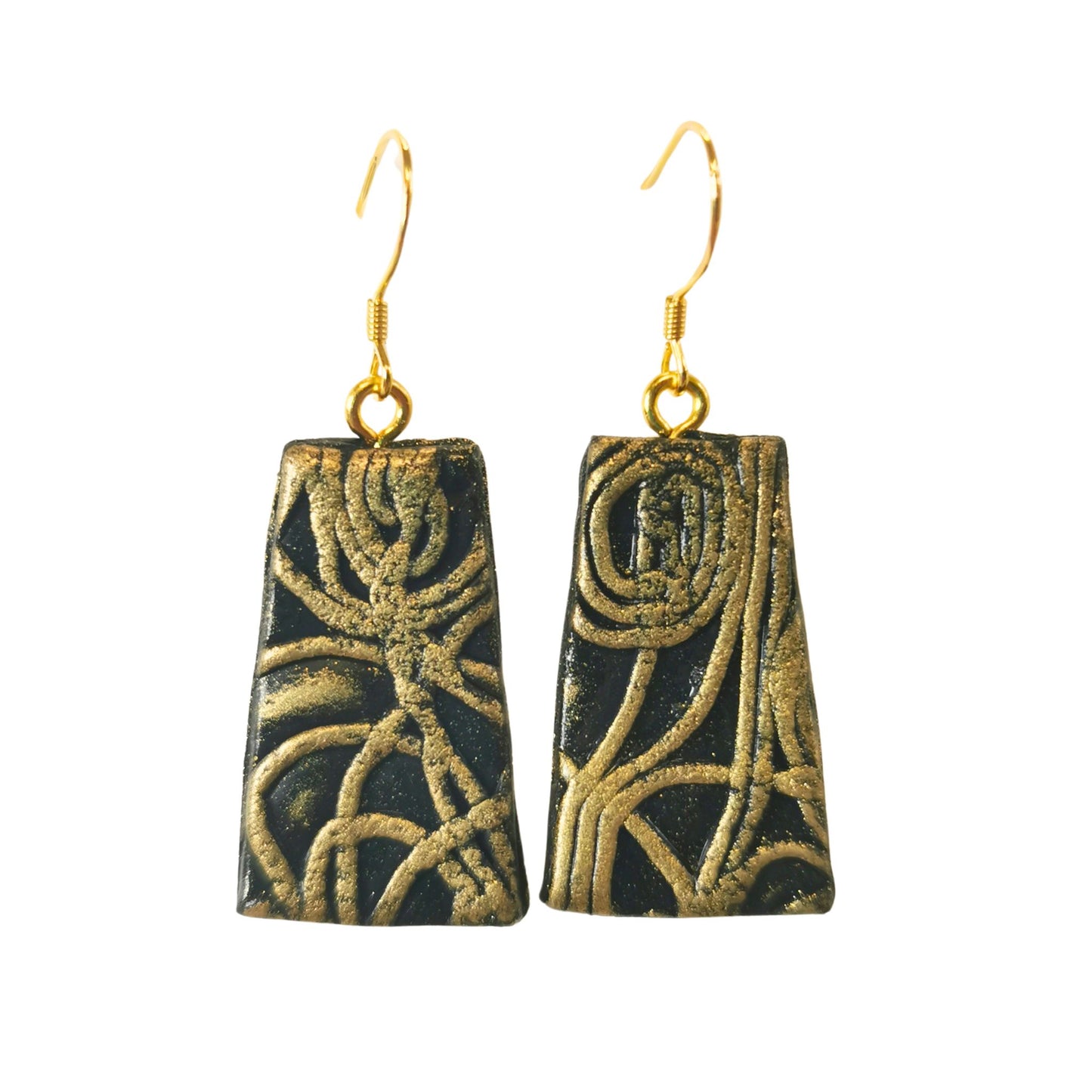 Rectangular shaped black earrings with gold accents