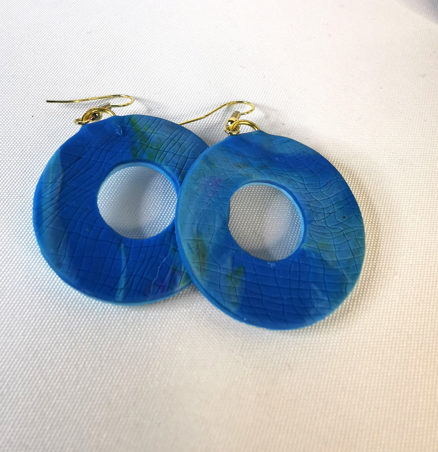 Blue and white donut earring