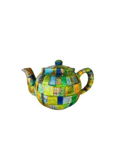 Teapot with green patchwork patterns