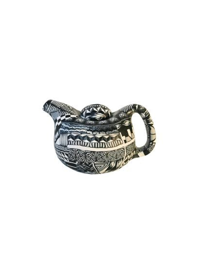 Teapot with black and white doodles