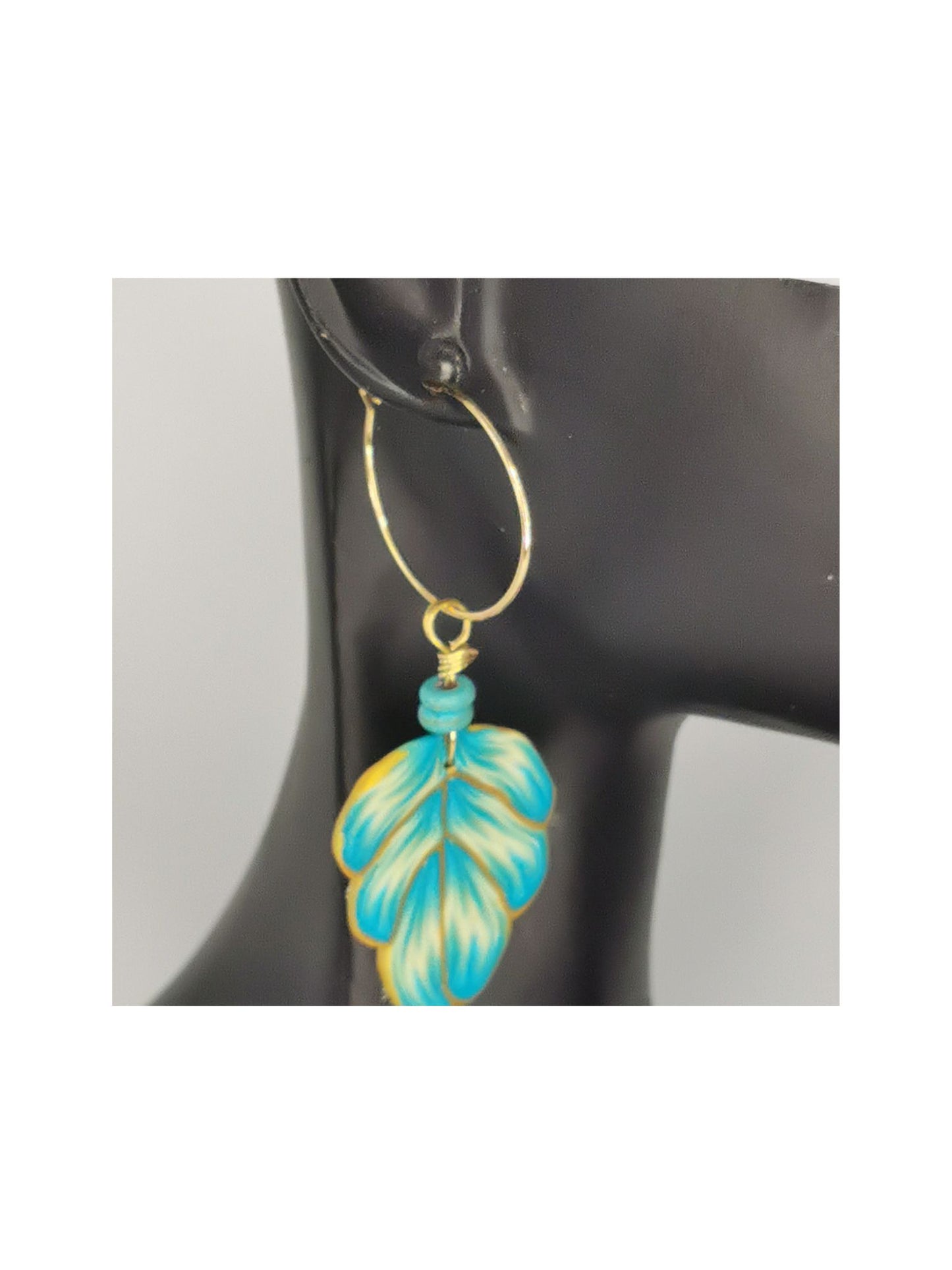 Turquoise and gold leaf shaped dangling earrings