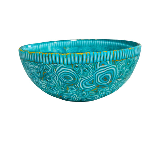 Small turquoise bowl with gold accents